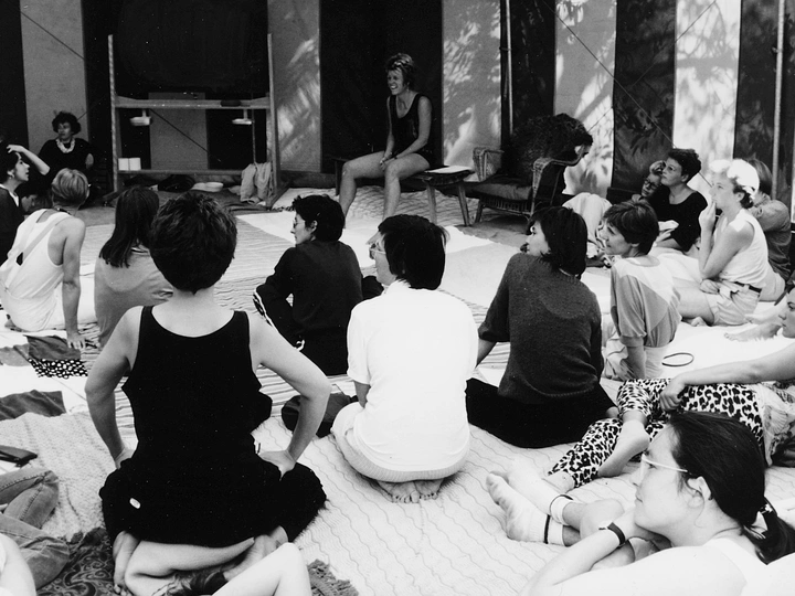 Smoking in front, kissing behind the house