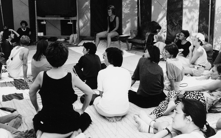 Smoking in front, kissing behind the house