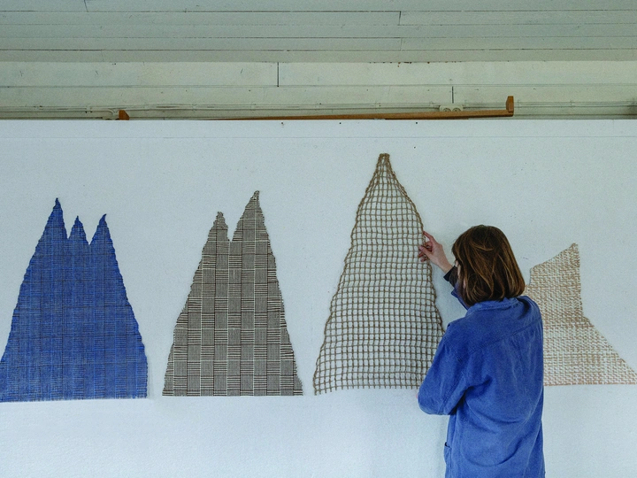 Paper yarn as a weaving material